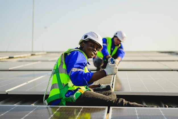 Engineer inspecting solar panels